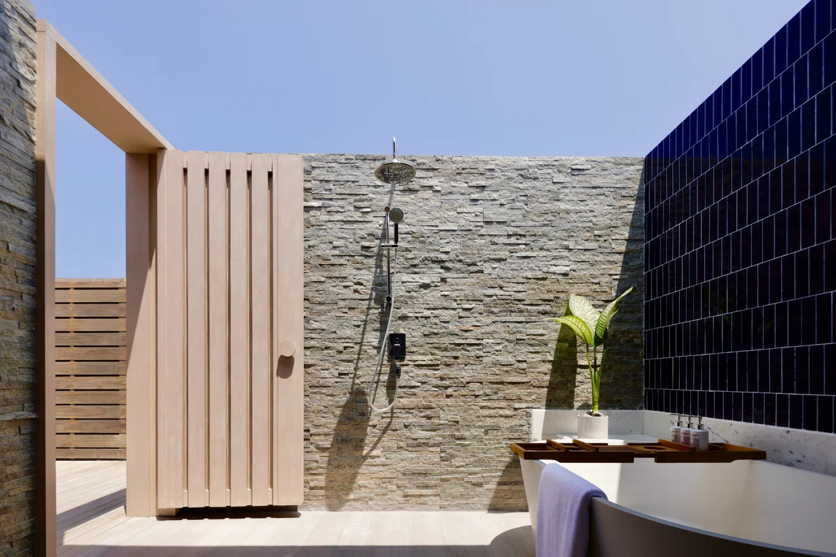 Avani+ Fares Maldives Resort, Over water villa bathroom